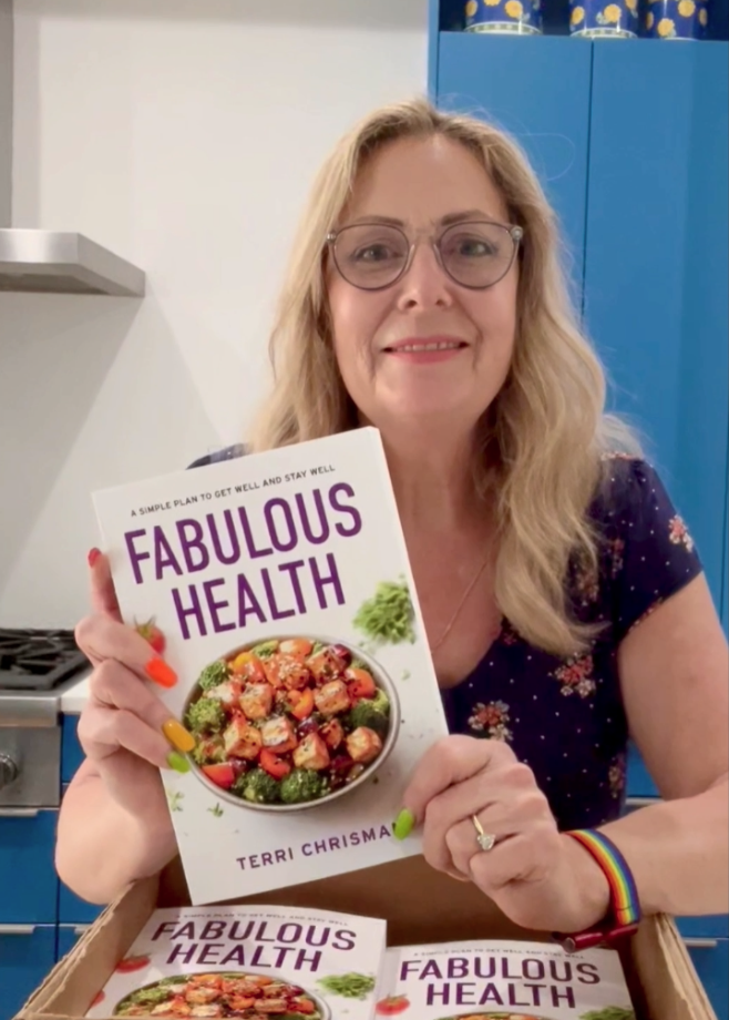 Terri Chrisman holding her book James Boardman with his book